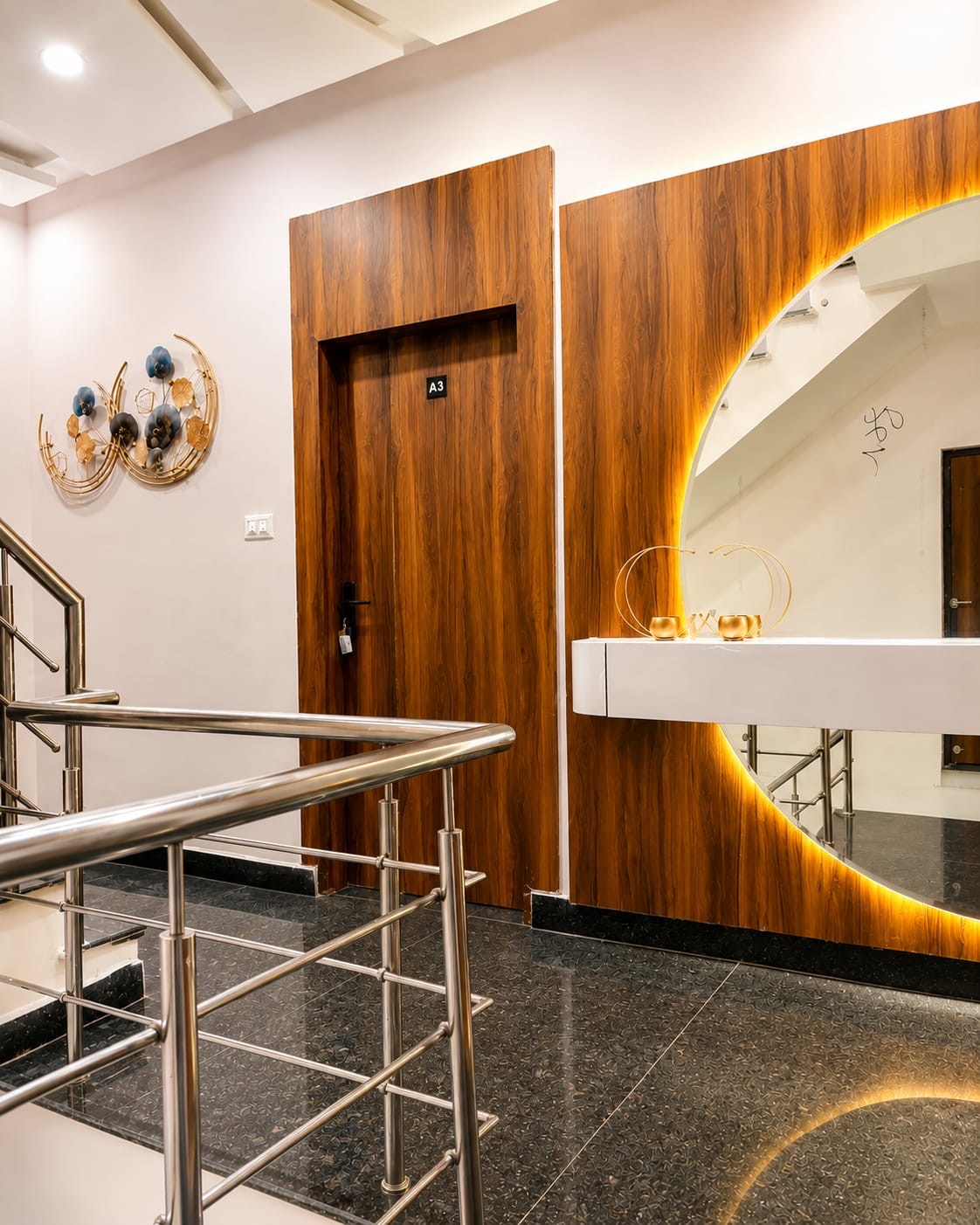 Hotel interior with staircase and corridor at Hotel Katra Retreat